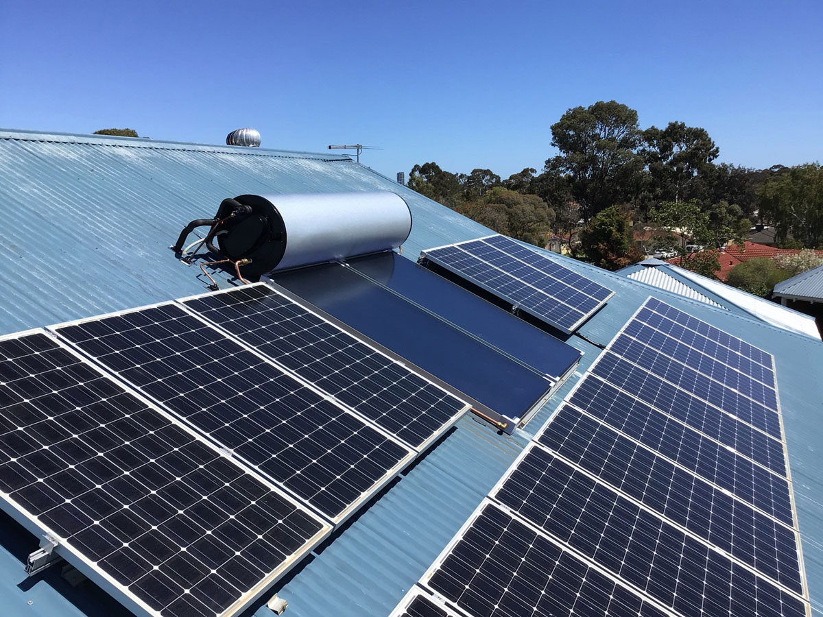 Enphase Solar Battery Repairs in Perth 3 Solar panels and hot water tank on a Perth Colorbond roof