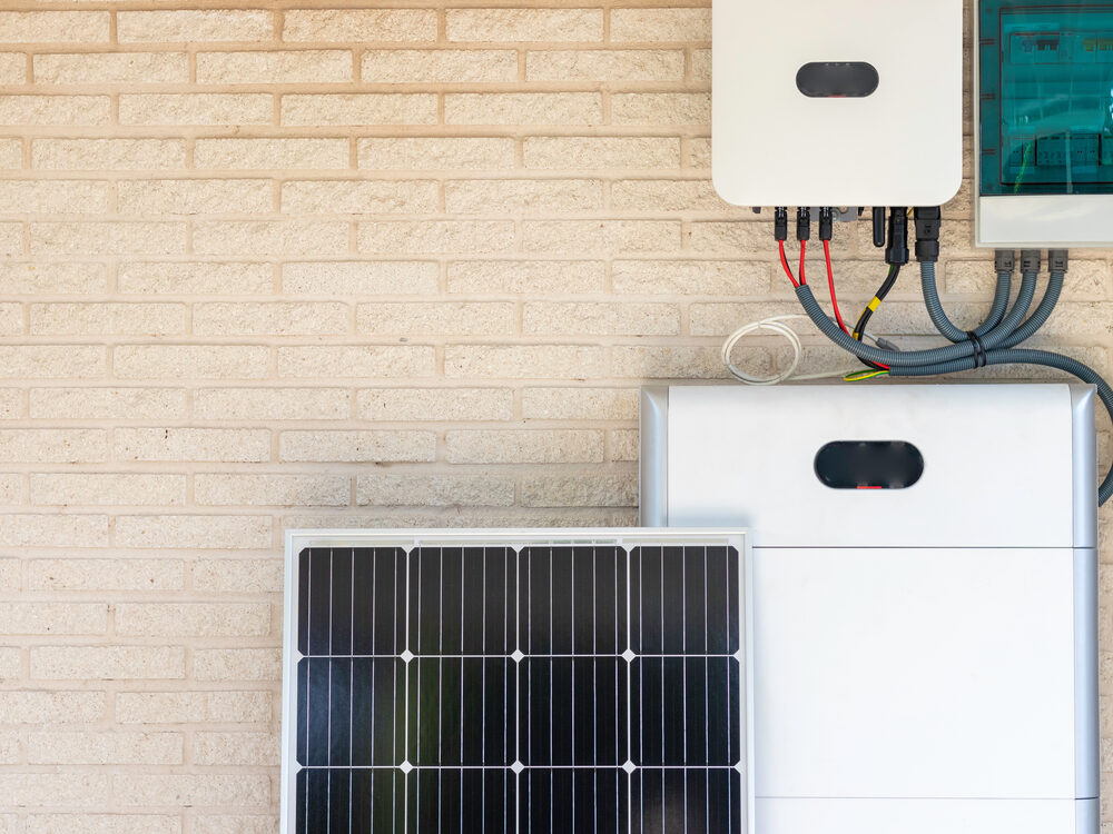 Solar Battery Rebates Perth | Solar Repairs 2 Home battery, inverter and solar panel installed on a brick wall
